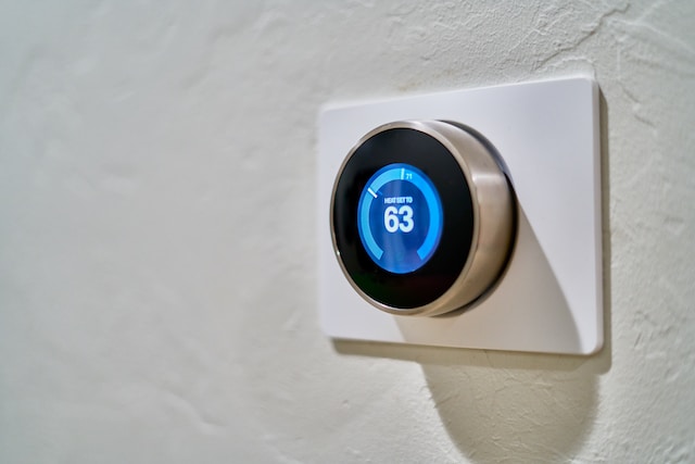 Indoor thermostat set to 63 degrees Fahrenheit 