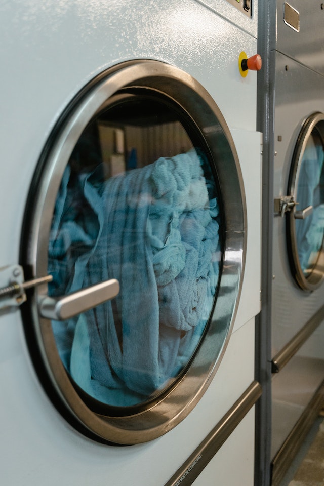 Dryer with blue clothing